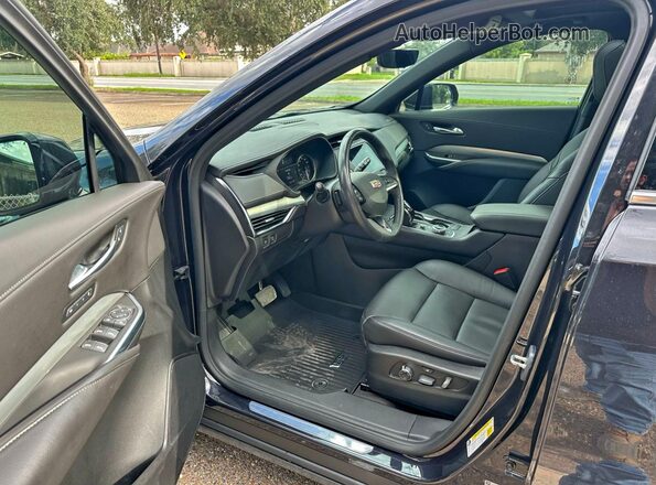 1GYFZDR43PF174188 2023 CADILLAC XT4 Blue Widok tylnych siedzeń