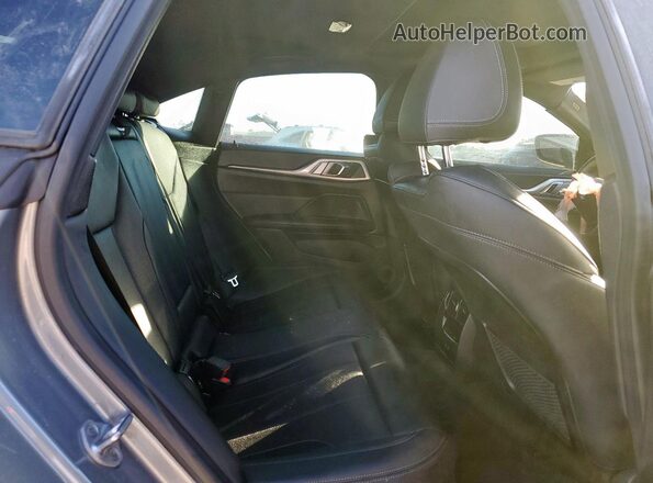 WBA63AV02RFR94920 2024 BMW 4 SERIES Gray Vista interior trasera