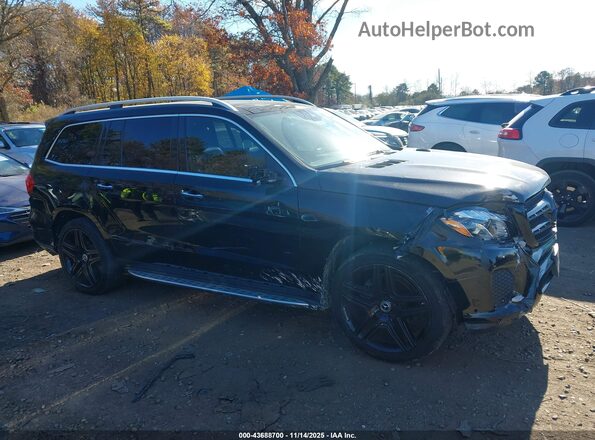4JGDF6EE0KB230521 2019 MERCEDES-BENZ GLS 450 Black Vista interior trasera