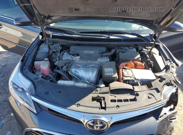 4T1BD1EB4JU061127 2018 TOYOTA AVALON Charcoal Vista interior trasera