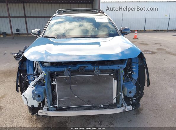 4T3E6RFV1PU138518 2023 TOYOTA RAV4 HYBRID Синий Вид задней части салона