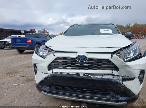 4T3E6RFV4MU047609 2021 TOYOTA RAV4 HYBRID White ხელსაწყოთა პანელის ხედი