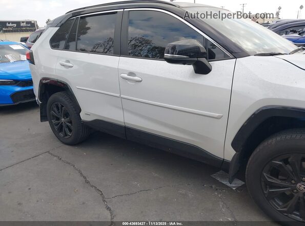 4T3E6RFV4PU139341 2023 TOYOTA RAV4 HYBRID White Rear interior view