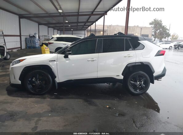 4T3E6RFV5MU063091 2021 TOYOTA RAV4 HYBRID White უკანა სალონის ხედი