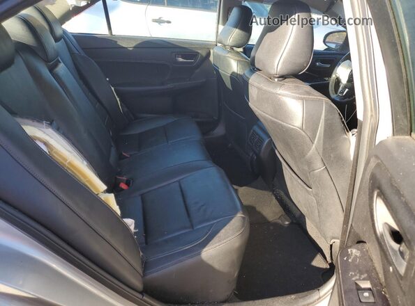 4T4BF1FK2GR549869 2016 TOYOTA LE Silver Widok tylnych siedzeń