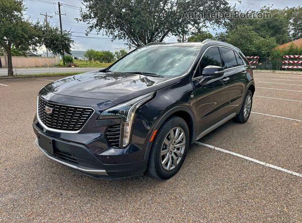 1GYFZDR43PF174188 2023 CADILLAC XT4 Blue Tył prawy