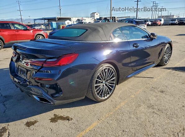 WBAFY4C03MCF29680 2021 BMW M8 Blue Delantero derecho