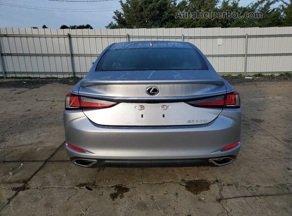58ADZ1B18PU157012 2023 LEXUS ES Silver Rear view