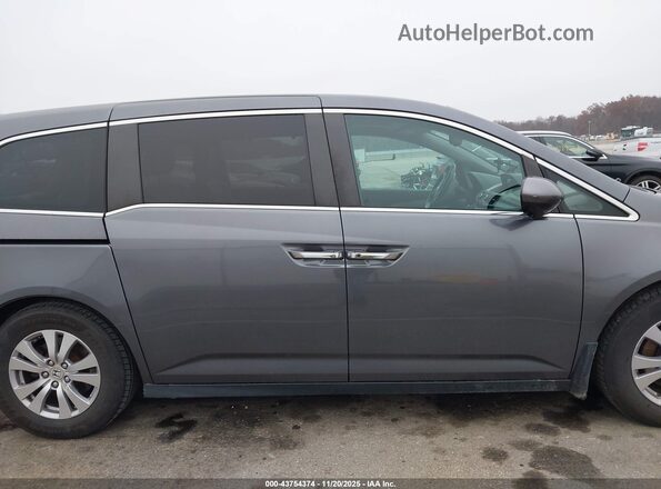 5FNRL5H69GB050167 2016 HONDA ODYSSEY Gray Սալոնի հետևի տեսք
