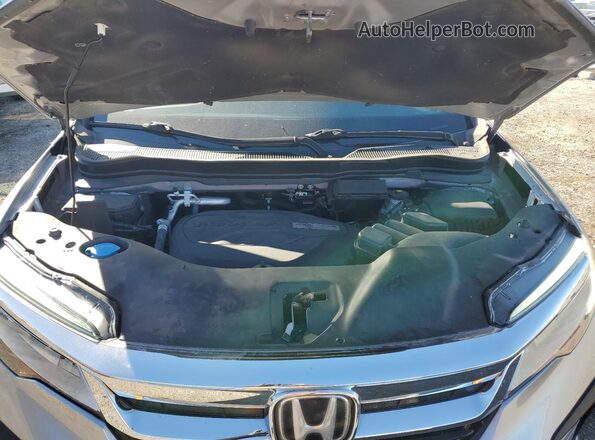 5FNYF6H67LB016599 2020 HONDA PILOT Серебряный Вид задней части салона