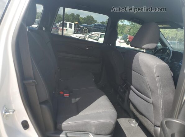 5FNYF7H26MB002987 2021 HONDA PASSPORT Белый Вид задней части салона