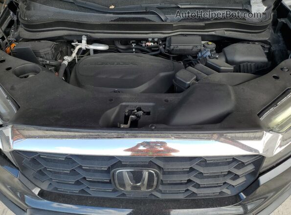5FNYF7H50NB005377 2022 HONDA PASSPORT Black Vista del compartimento del motor
