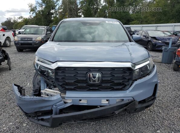 5FNYF7H58NB006552 2022 HONDA PASSPORT Teal Դիմացի տեսք