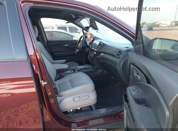 5FNYF8H00MB019949 2021 HONDA PASSPORT Темно-бордовый Вид салона спереди