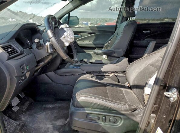 5FNYF8H04LB004885 2020 HONDA PASSPORT Черный Вид салона спереди