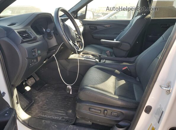 5FNYF8H05PB030191 2023 HONDA PASSPORT White Widok wnętrza z przodu