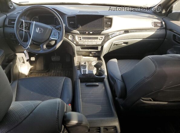 5FNYF8H05PB030191 2023 HONDA PASSPORT White Widok deski rozdzielczej