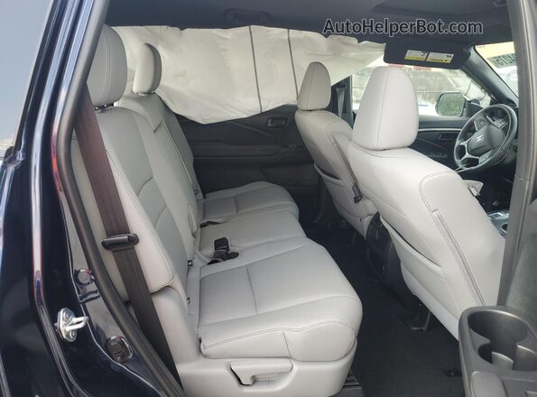 5FNYF8H55PB041767 2023 HONDA PASSPORT Blue Vista interior trasera