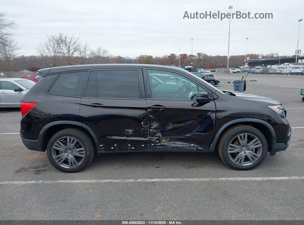 5FNYF8H56KB023027 2019 HONDA PASSPORT Black Вид задньої частини салону