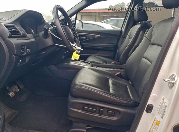 5FNYF8H59MB001820 2021 HONDA PASSPORT White Front interior view