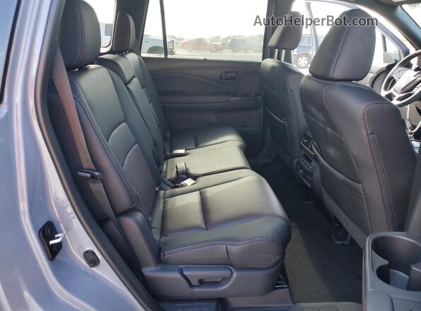 5FNYF8H8XRB022967 2024 HONDA PASSPORT Синий Вид задней части салона