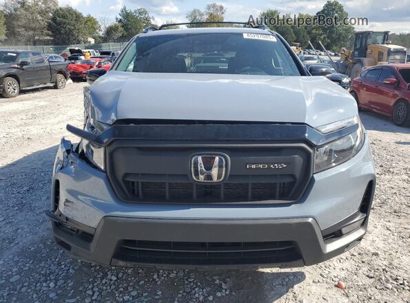 5FNYF8H8XRB022967 2024 HONDA PASSPORT Синий Вид спереди