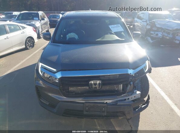 5FPYK3F76PB018007 2023 HONDA RIDGELINE Gray Vista interior trasera