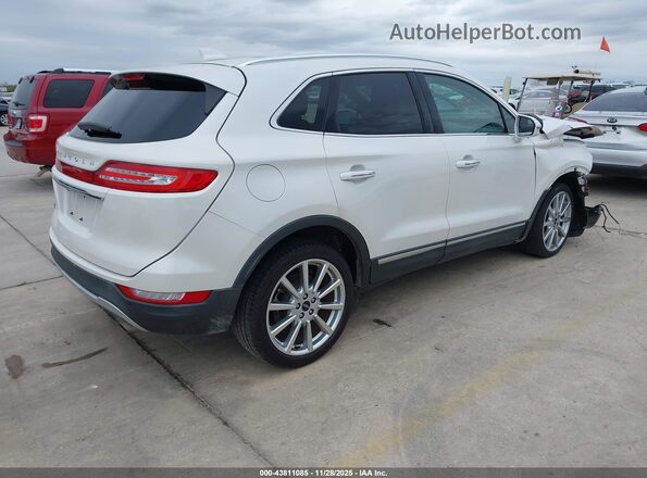 5LMCJ3C98KUL23285 2019 LINCOLN MKC White Rear right