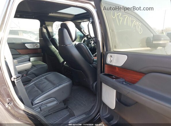 5LMJJ2LG6PEL15994 2023 LINCOLN NAVIGATOR Black Vista de la etiqueta del VIN