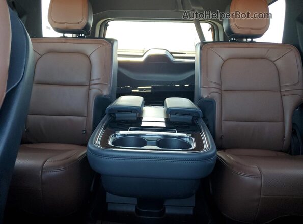 5LMJJ2LG8PEL15527 2023 LINCOLN NAVIGATOR Gray Vista de los asientos traseros