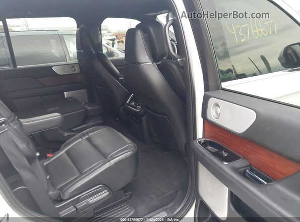 5LMJJ2LT5LEL20787 2020 LINCOLN NAVIGATOR White VIN კოდის სტიკერის ხედი