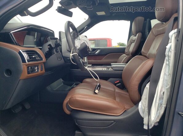 5LMJJ3LG6PEL06444 2023 LINCOLN NAVIGATOR Blue Vista interior delantera