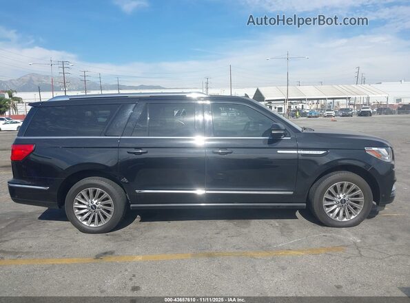 5LMJJ3NT0LEL00756 2020 LINCOLN NAVIGATOR Черный Вид задней части салона