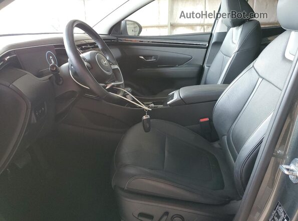 5NMJCCAE8NH009382 2022 HYUNDAI TUCSON Серый Вид салона спереди