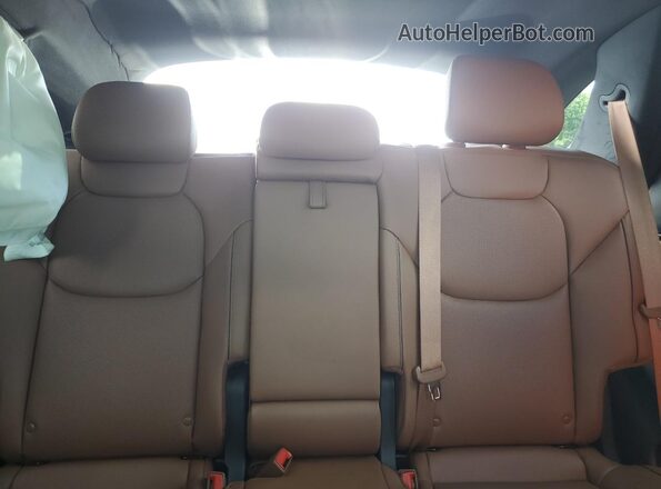 5NMMADTB4RH016458 2024 GENESIS GV70 White Rear seats view