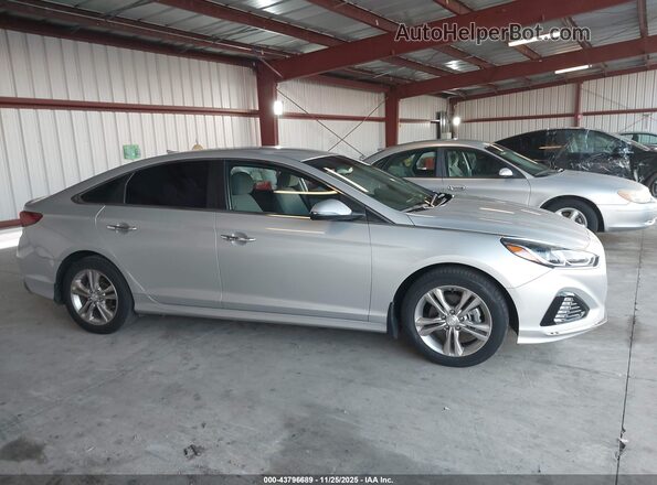 5NPE34AF0JH726758 2018 HYUNDAI SONATA Серебряный Вид задней части салона