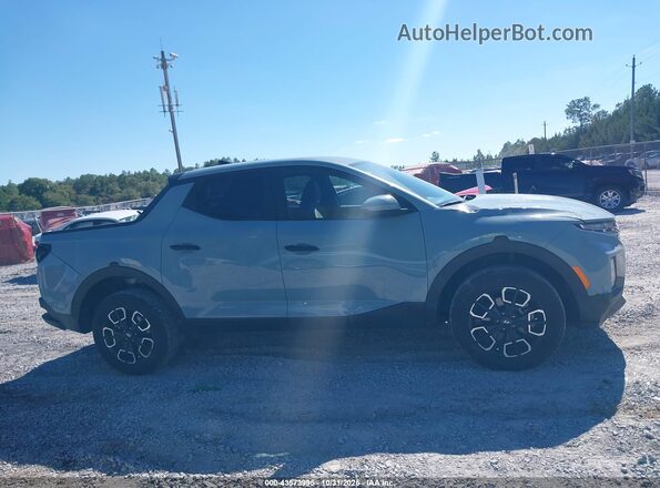 5NTJB4DE8RH103843 2024 HYUNDAI SANTA CRUZ Light Blue Вид задней части салона