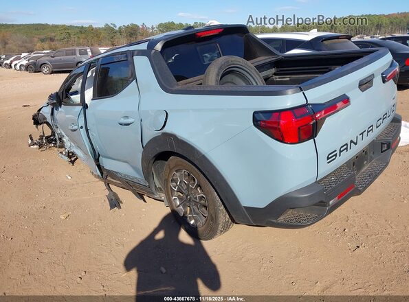 5NTJDDAF3PH059481 2023 HYUNDAI SANTA CRUZ Blue Trasero izquierdo