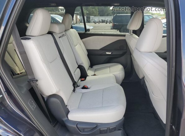 5TDAAAA62SS014346 2025 LEXUS TX Blue Rear interior view