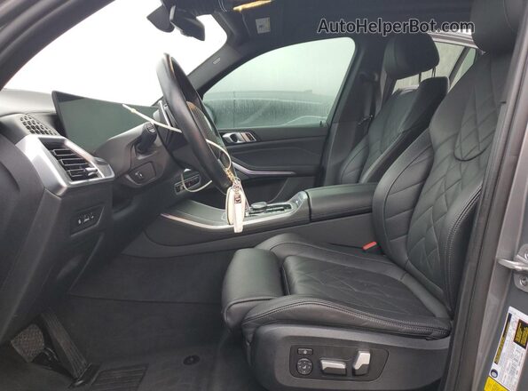 5UX13EU04R9S48889 2024 BMW X5 Silver Front interior view
