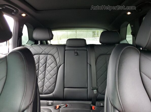 5UX13EU04R9S48889 2024 BMW X5 Silver Rear seats view