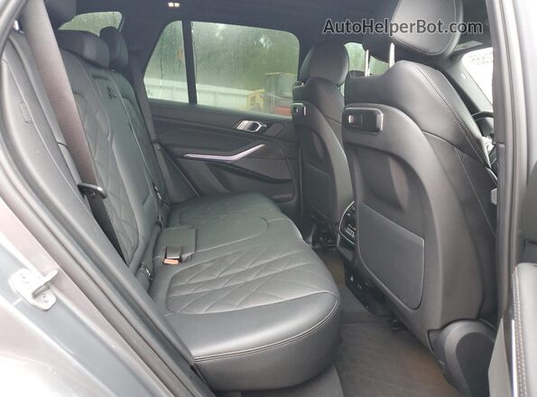 5UX13EU04R9S48889 2024 BMW X5 Silver Rear interior view