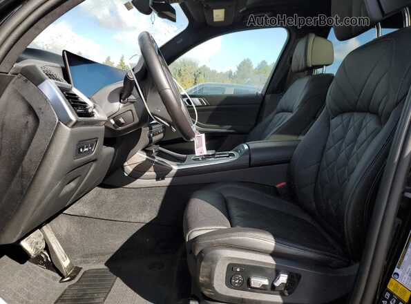 5UX23EM06R9U16116 2024 BMW X7 Black Սալոնի դիմացի տեսք