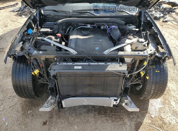 5UX23EM06R9U16116 2024 BMW X7 Black Սալոնի հետևի տեսք