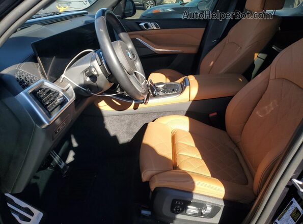 5UX23EU07R9S36319 2024 BMW X5 Blue Widok wnętrza z przodu
