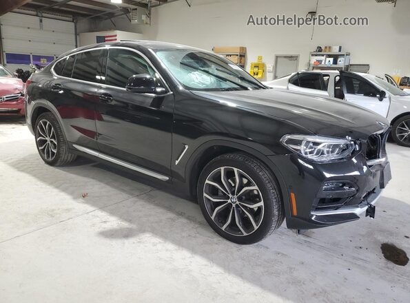 5UX2V1C02M9F43235 2021 BMW X4 Black Delantero derecho