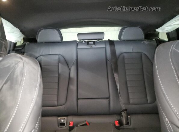 5UX2V1C02M9F43235 2021 BMW X4 Black Vista de los asientos traseros