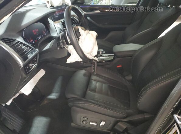 5UX2V1C02M9F43235 2021 BMW X4 Black Vista interior delantera