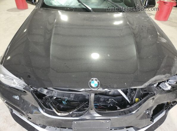5UX2V1C02M9F43235 2021 BMW X4 Black Vista del compartimento del motor