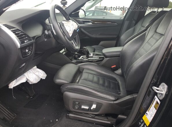 5UX2V1C02M9G81356 2021 BMW X4 Black Widok wnętrza z przodu